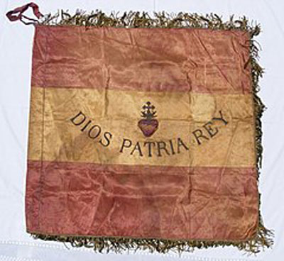 Bandera con el lema carlista. Fuente: es.wikipedia.org